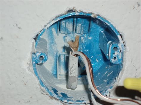 can i bury junction box behind light in ceiling|closing electrical junction box.